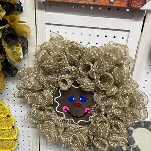 Festive Gold Mesh Wreath with Smiling Face